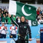 Young archer raises national flag 20260930010136