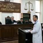 Doctor standing in courtroom 20261004003118